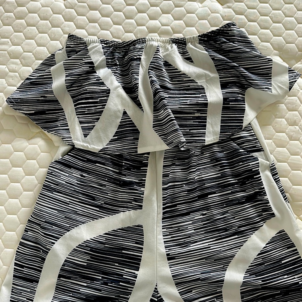 Strapless shorts romper. Black and white. Never worn.